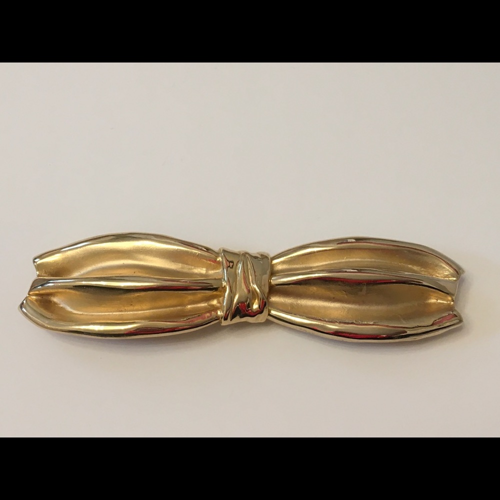 1980’s Vintage two-piece belt buckle in a bow tie or bow shape.